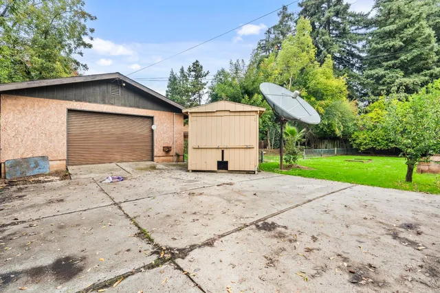 a house view with a garden space