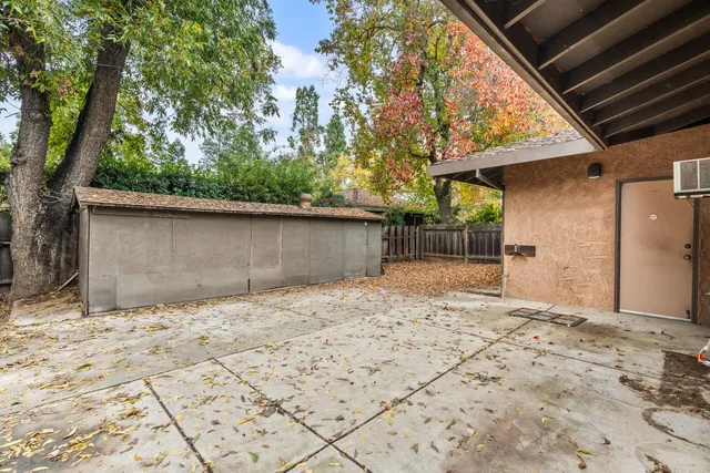 an aerial view of a house with a garden