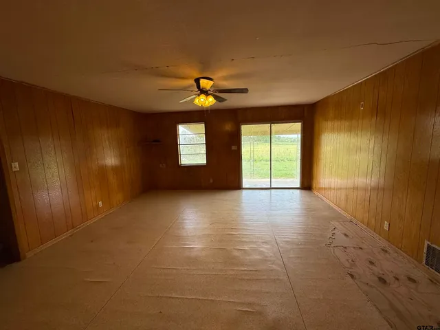 a large kitchen with a window