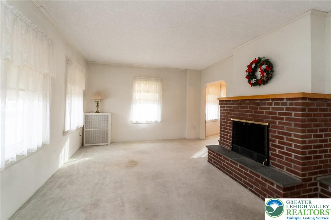 2003 Kemmerer Street Bethlehem, PA 18017 - Photo 16 of 49 a living room with furniture and a fireplace