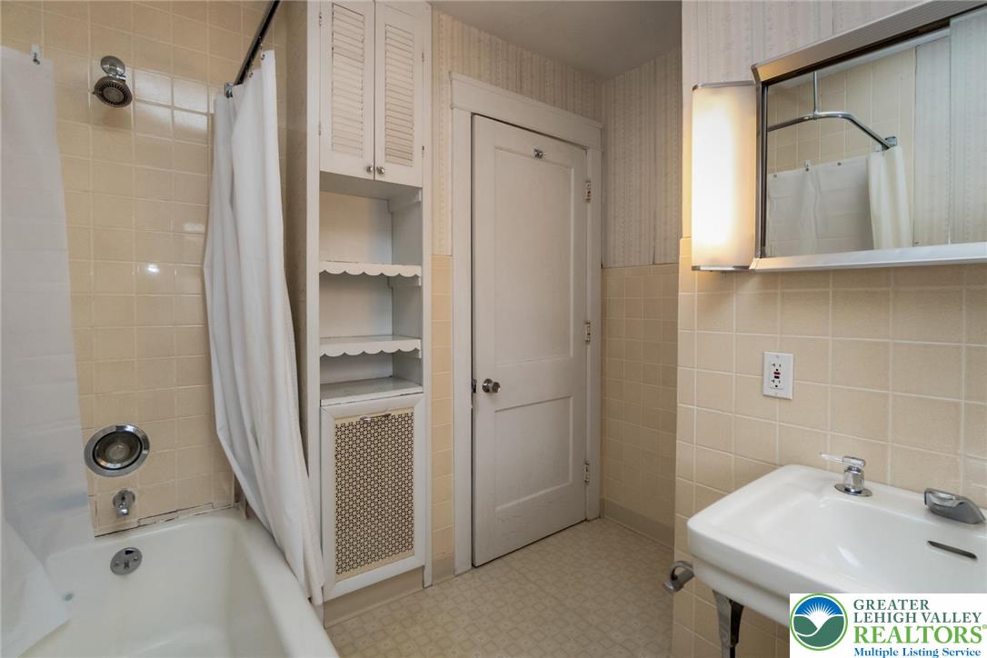 2003 Kemmerer Street Bethlehem, PA 18017 - Photo 31 of 49 a bathroom with a sink a toilet and shower