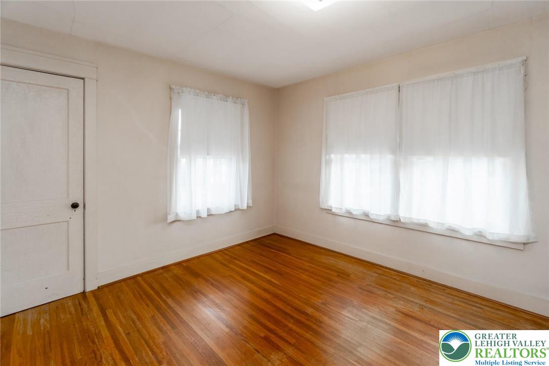 2003 Kemmerer Street Bethlehem, PA 18017 - Photo 39 of 49 a view of empty room with window and wooden floor