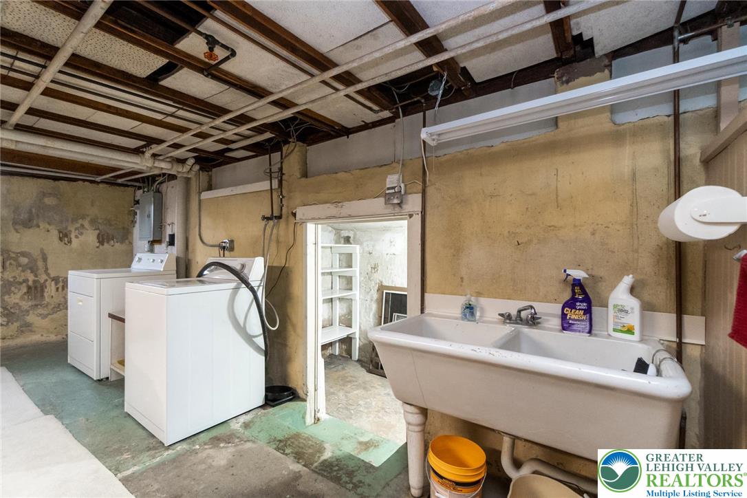 2003 Kemmerer Street Bethlehem, PA 18017 - Photo 46 of 49 a bathroom with a sink mirror vanity and toilet