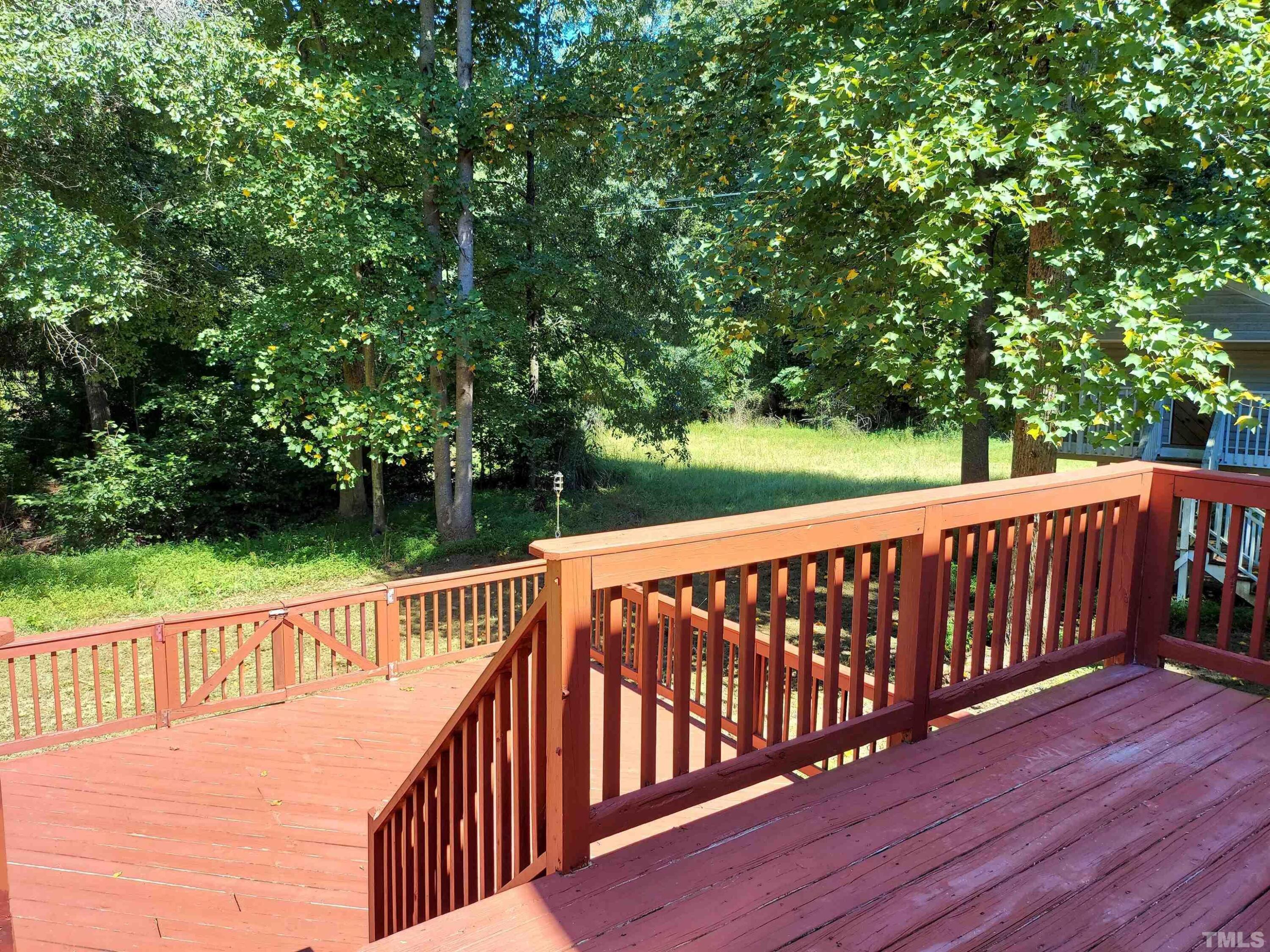 224 Crossfire Road Holly Springs, NC 27540 - Photo 40 of 43 a view of deck with a yard