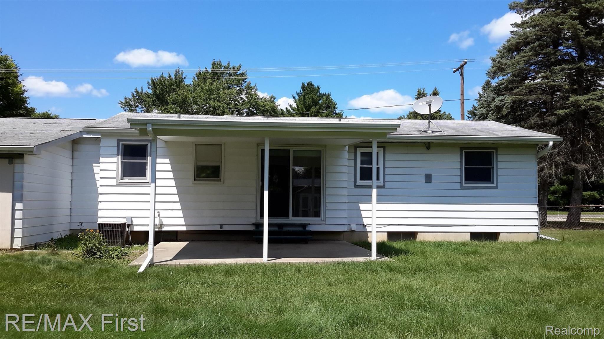 5290 East Carpenter Road Flint, MI 48506 - Photo 24 of 30 BACK ELEVATION W/ NEW COVERED PATIO