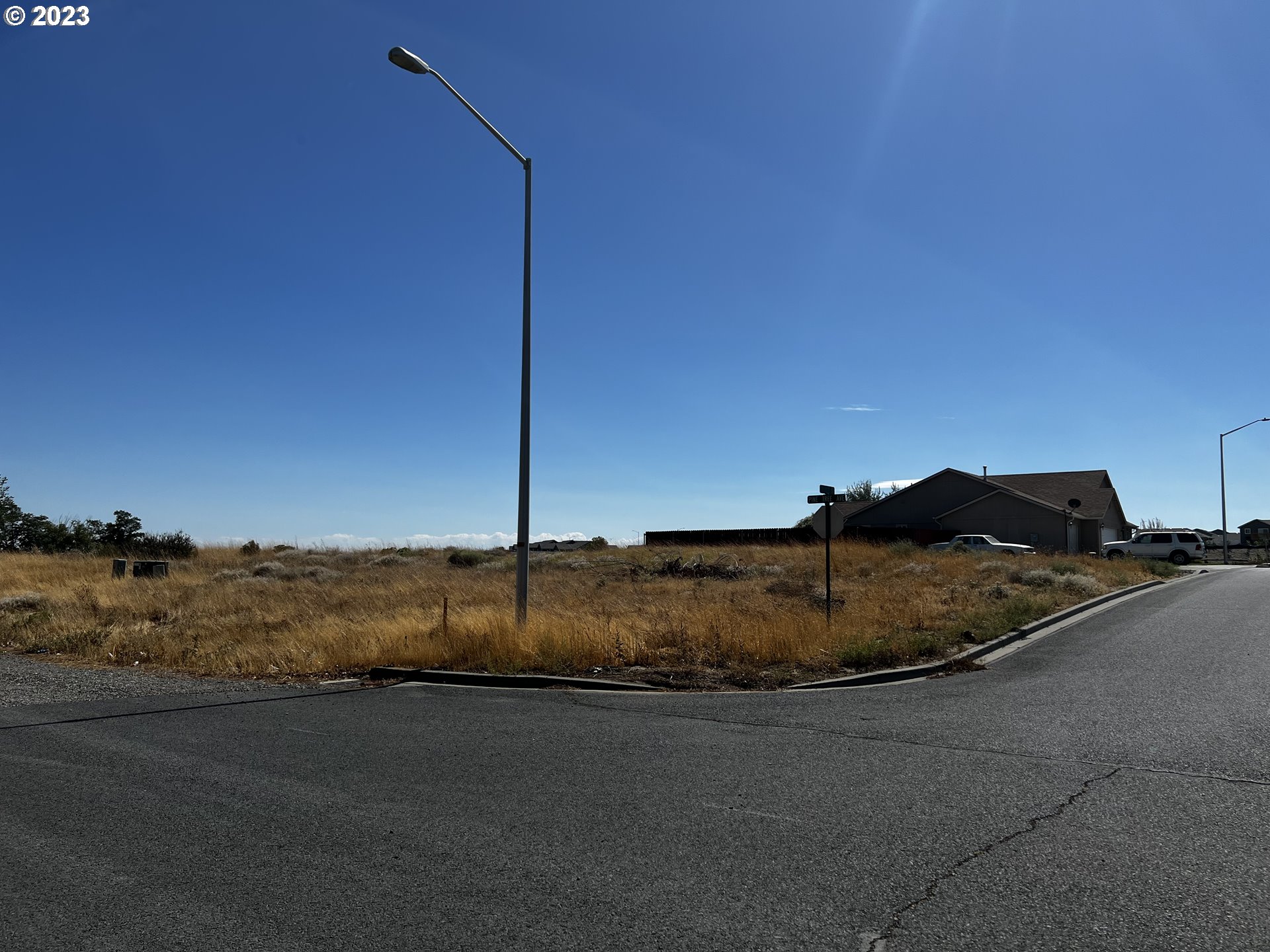 Pine Tree Umatilla Or 97882 Umatilla, OR 97882 - Photo 1 of 4 a view of a road with a ocean view