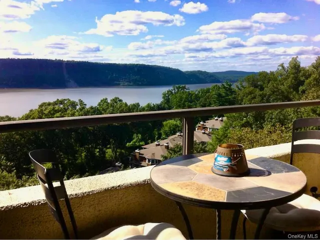 a view of a balcony and mountain view