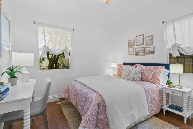 a bed room with a bed and a table