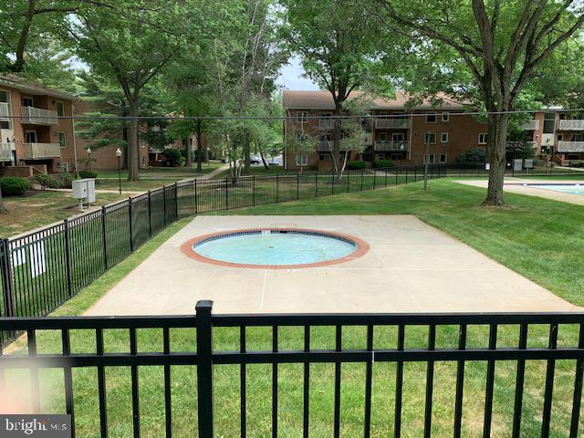 300 Winding Way, Unit 1 Downingtown, PA 19335 - Photo 13 of 13 Serene courtyard with inviting hot tub.