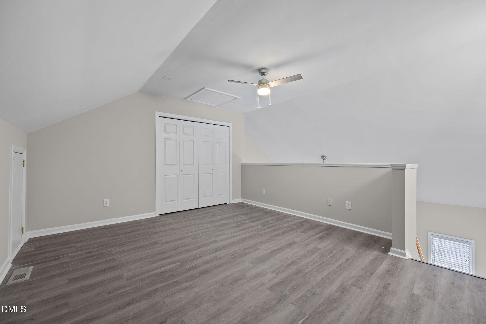 2813 Bedfordshire Court Raleigh, NC 27604 - Photo 32 of 44 a view of empty room with wooden floor