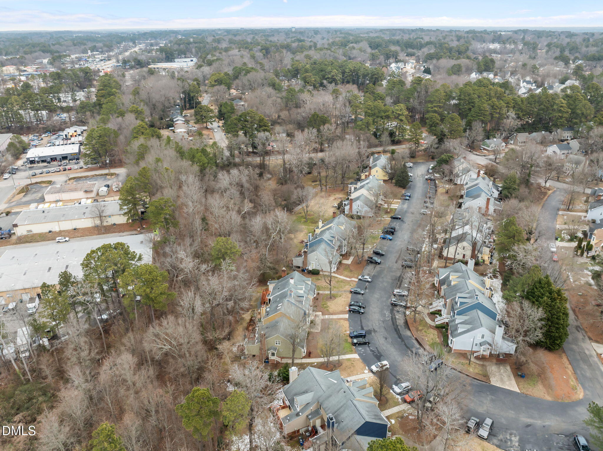 2813 Bedfordshire Court Raleigh, NC 27604 - Photo 40 of 44 an aerial view of residential building and parking space