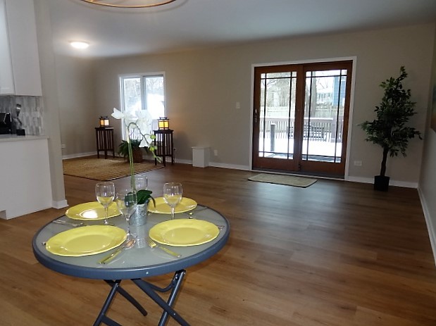 21 Buckingham Road Glen Ellyn, IL 60137 - Photo 11 of 38 a view of a dining room with furniture and wooden floor