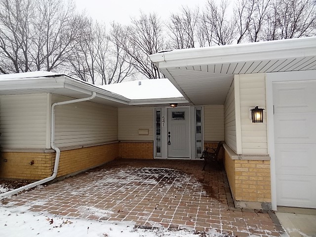 21 Buckingham Road Glen Ellyn, IL 60137 - Photo 2 of 38 a view of a house with a garage