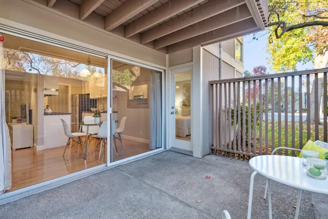 a view of a porch with furniture