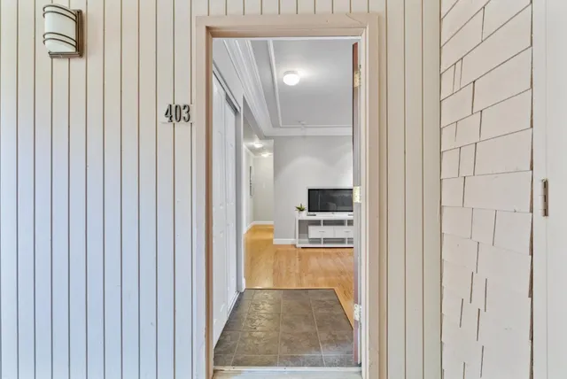 a en suite bathroom with a granite countertop sink