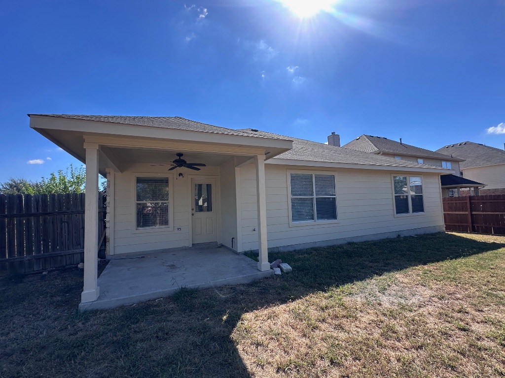 12720 Waynespur Lane Elgin, TX 78621 - Photo 30 of 31 a view of a house with a yard