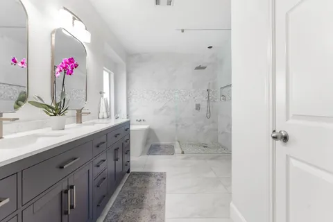 a bedroom with a bed and a couch