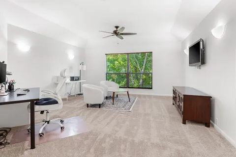 a bathroom with double vanity sinks and a mirror