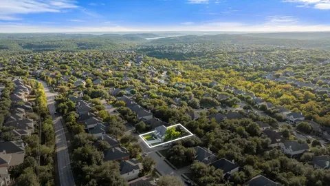 a view of a park with swings and slides