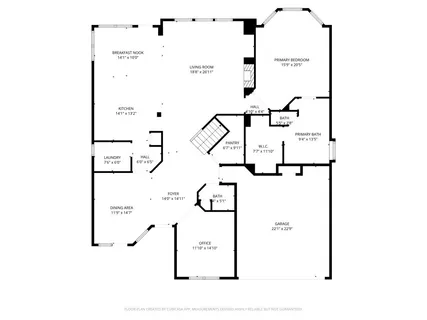 an aerial view of a residential houses covered in trees