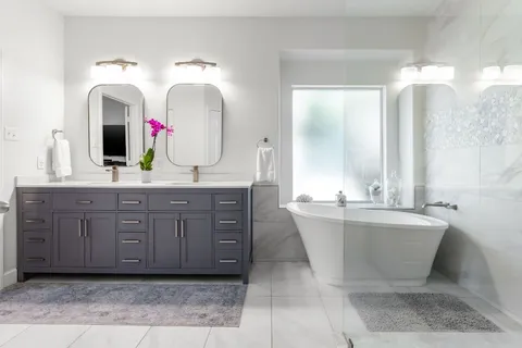 a living room with fireplace furniture and a flat screen tv
