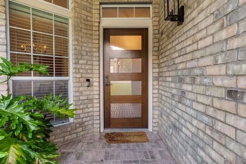 a view of a patio filled with furniture