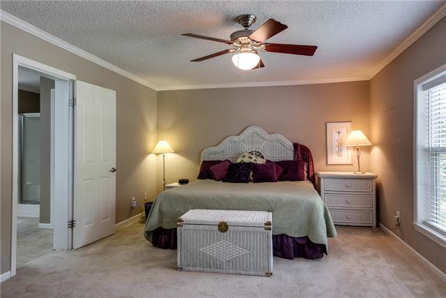 4232 Gourley Road Pegram, TN 37143 - Photo 9 of 19 The master bedroom is enormous and offers lots of privacy. It has a luxurious master bath and walk-in closet too.