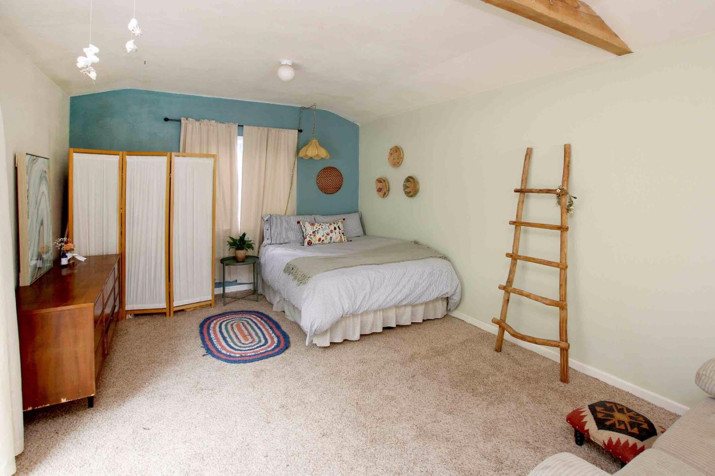 792 Lewis Road Watsonville, CA 95076 - Photo 18 of 39 a bedroom with a bed and a window