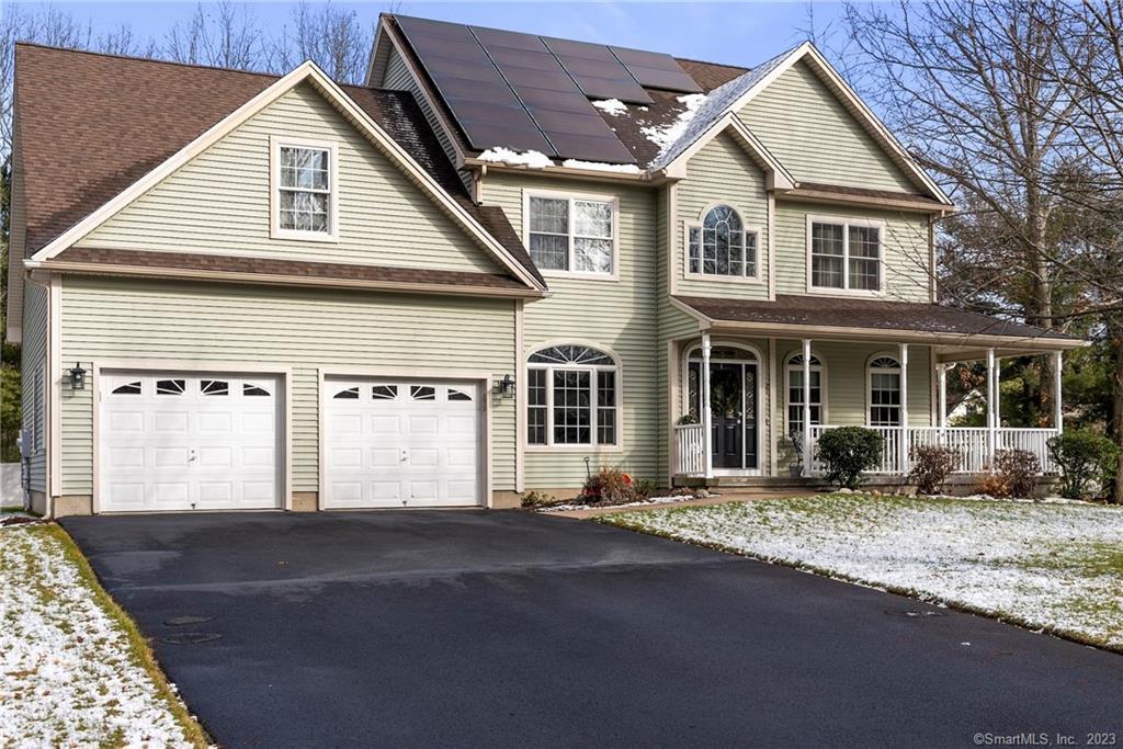 26 Privilege Road Bloomfield, CT 06002 - Photo 1 of 1 a front view of a house with a yard