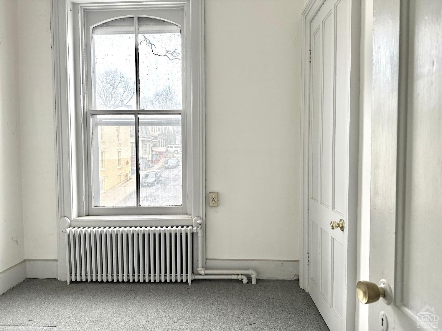 283 Main Street Catskill, NY 12414 - Photo 16 of 25 an empty room with windows
