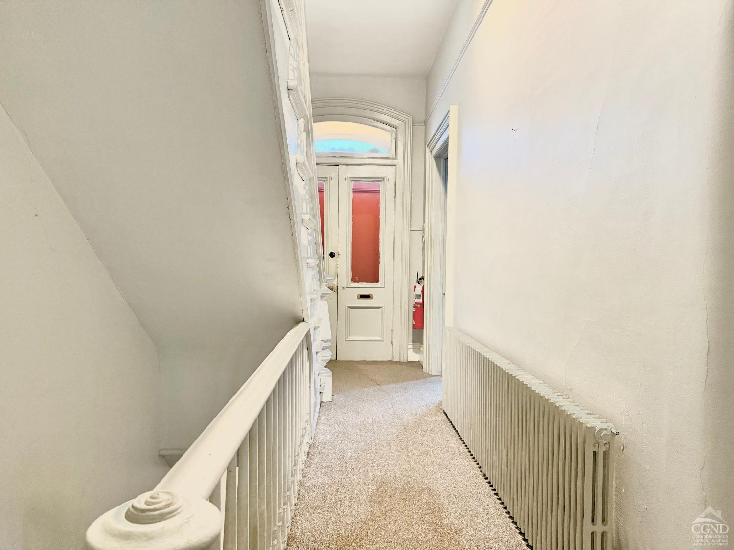 283 Main Street Catskill, NY 12414 - Photo 6 of 25 a view of hallway with stairs