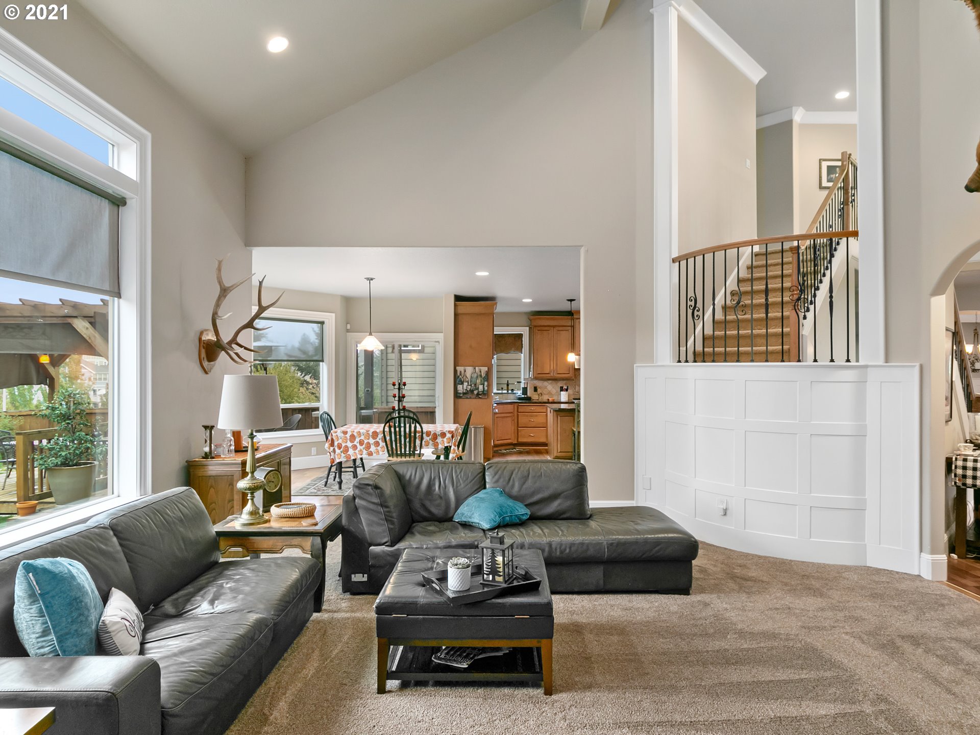 14741 Southeast Badger Creek Road Happy Valley, OR 97086 - Photo 18 of 32 a living room with furniture and a large window