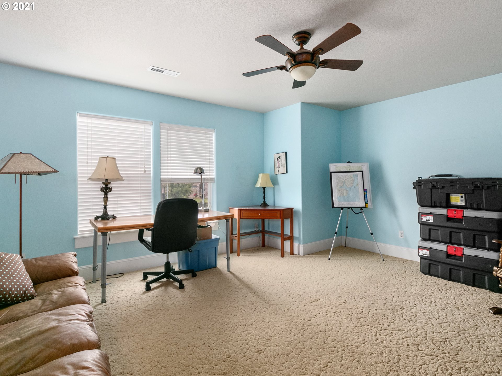 14741 Southeast Badger Creek Road Happy Valley, OR 97086 - Photo 26 of 32 a work room with furniture and a window
