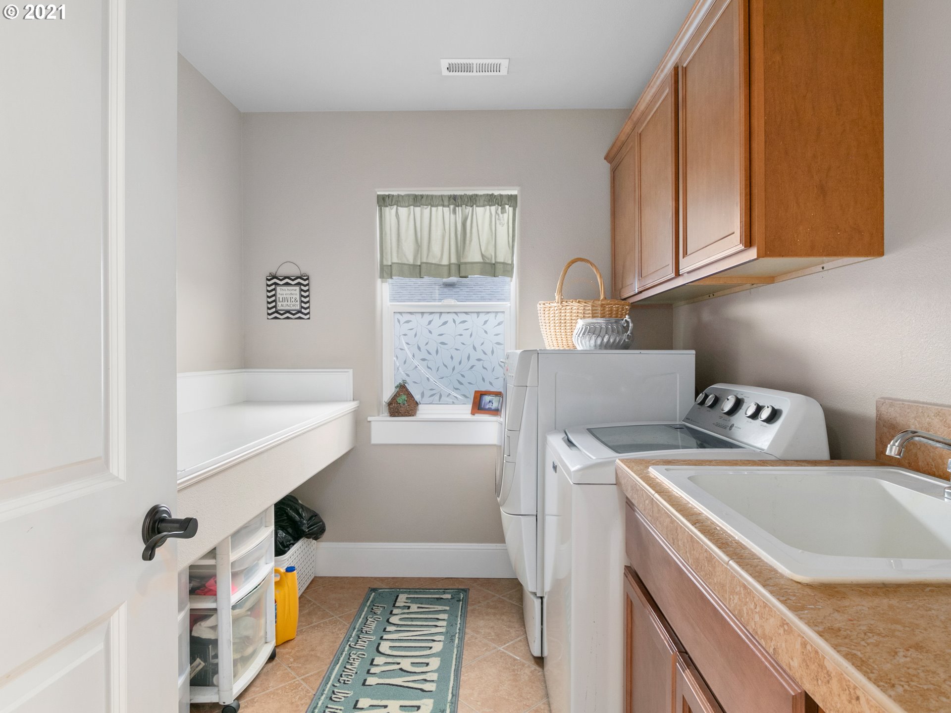 14741 Southeast Badger Creek Road Happy Valley, OR 97086 - Photo 27 of 32 a view of bathroom with dual sinks