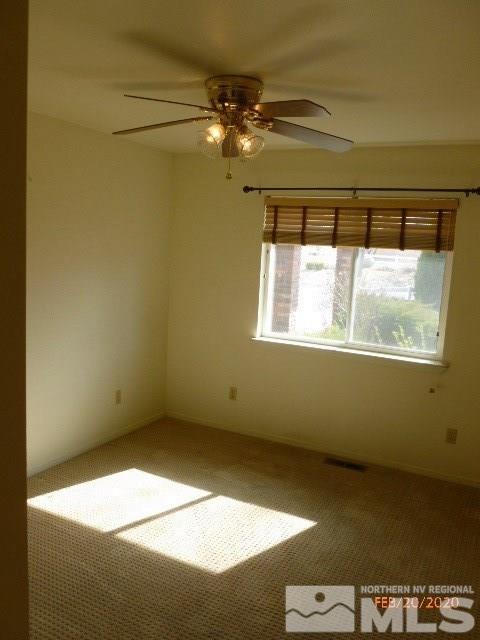1850 Rice Road Fallon, NV 89406 - Photo 9 of 23 a view of an empty room with a window