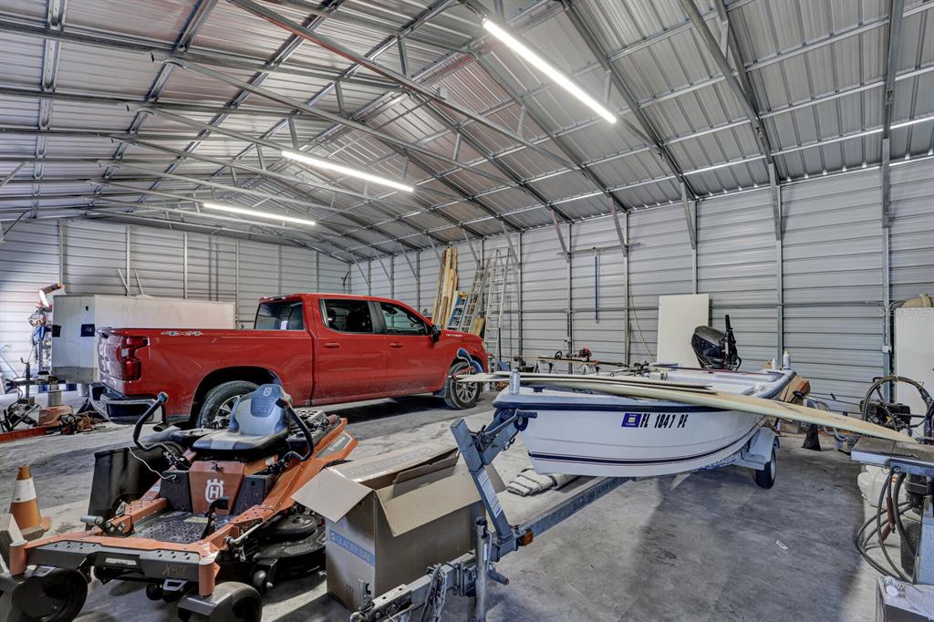 141 Woods Road San Mateo, FL 32187 - Photo 59 of 66 a utility room with furniture