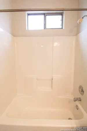 a bathroom with a bathtub