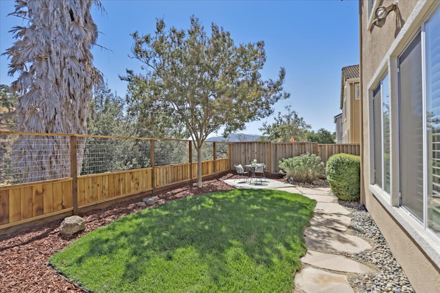 546 Esplanade Lane San Jose, CA 95138 - Photo 23 of 24 a view of a backyard with pathway