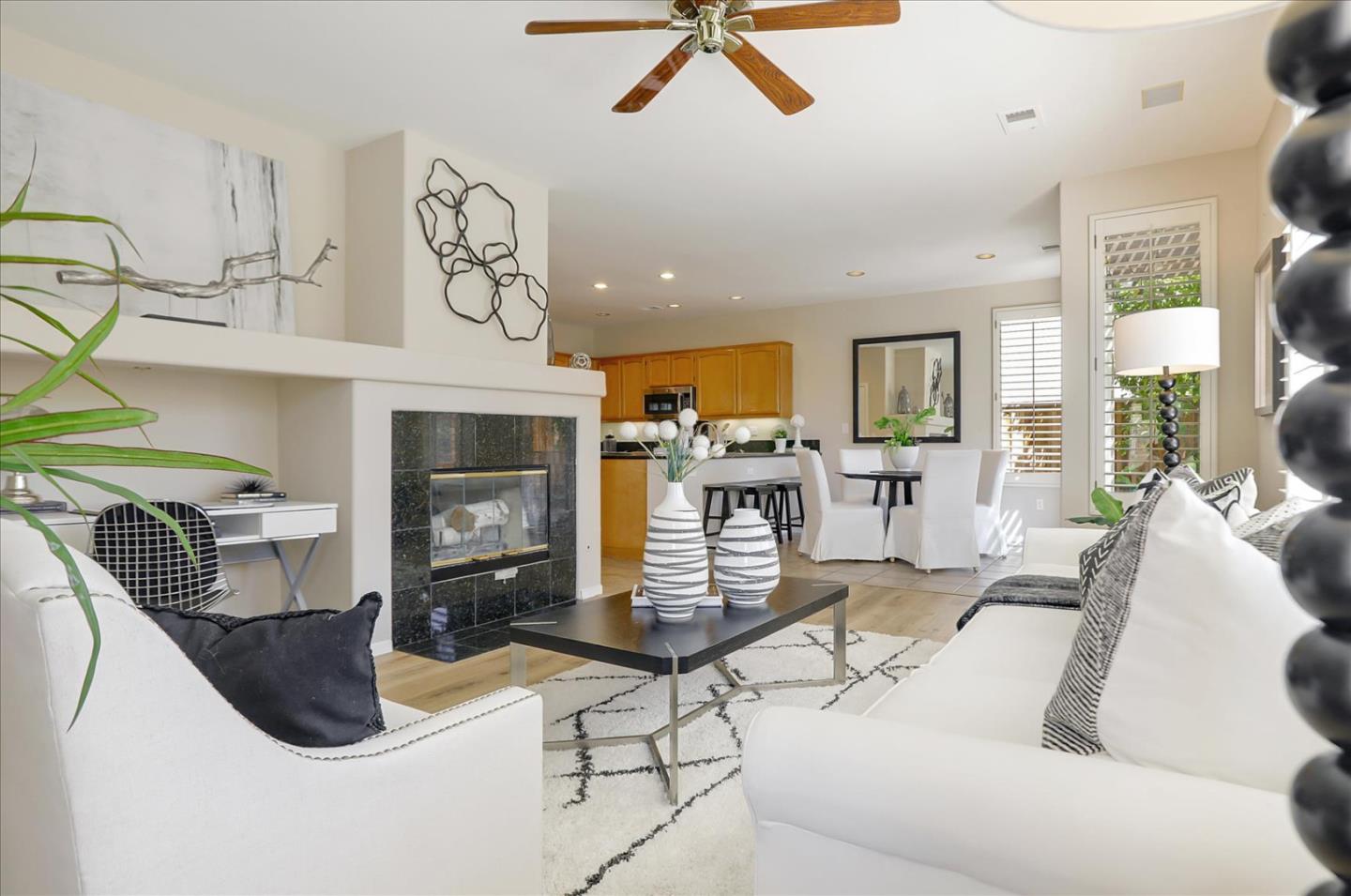 546 Esplanade Lane San Jose, CA 95138 - Photo 4 of 24 a living room with furniture and a fireplace