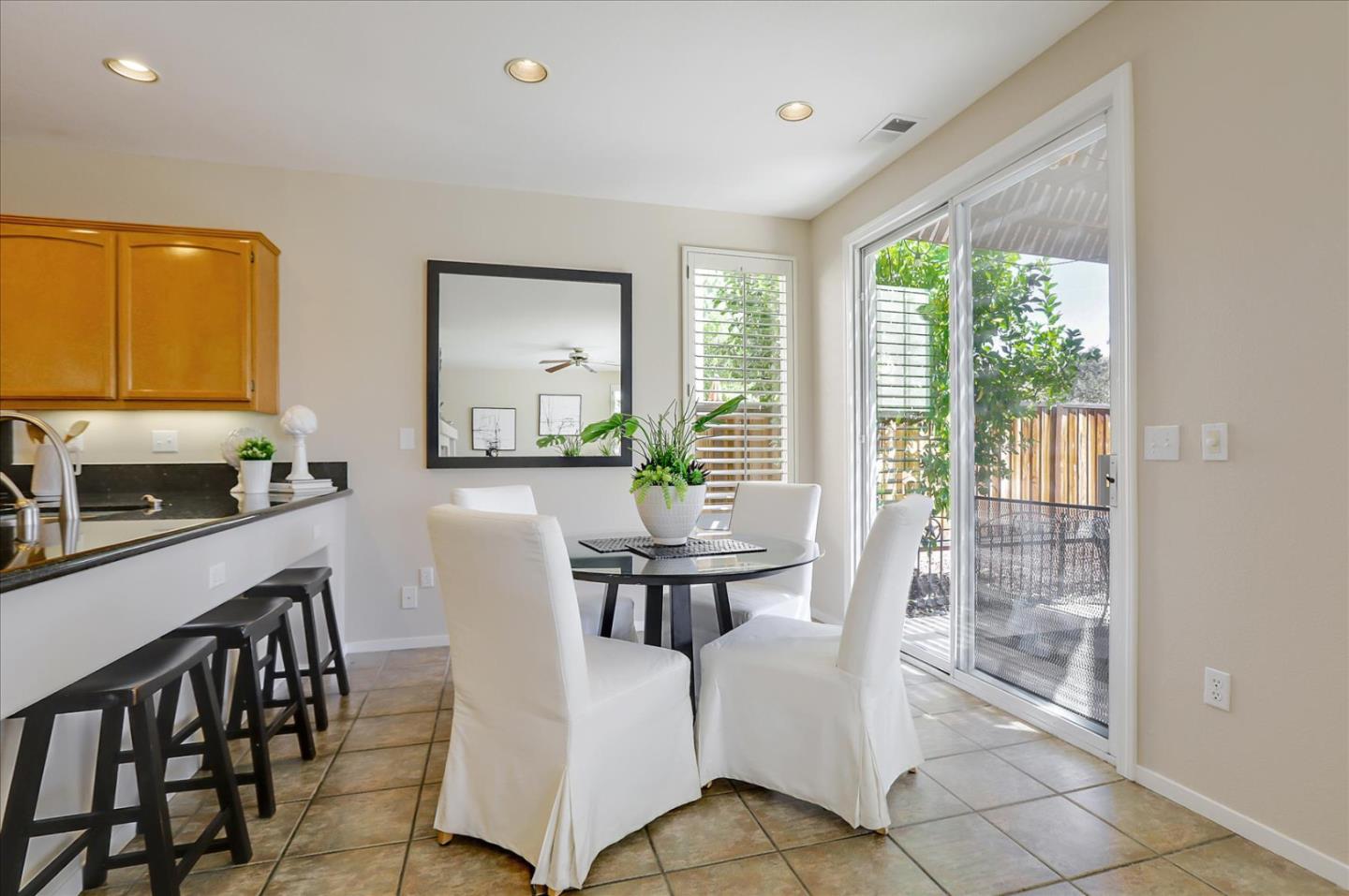 546 Esplanade Lane San Jose, CA 95138 - Photo 8 of 24 a view of a dining room with furniture window and outside view