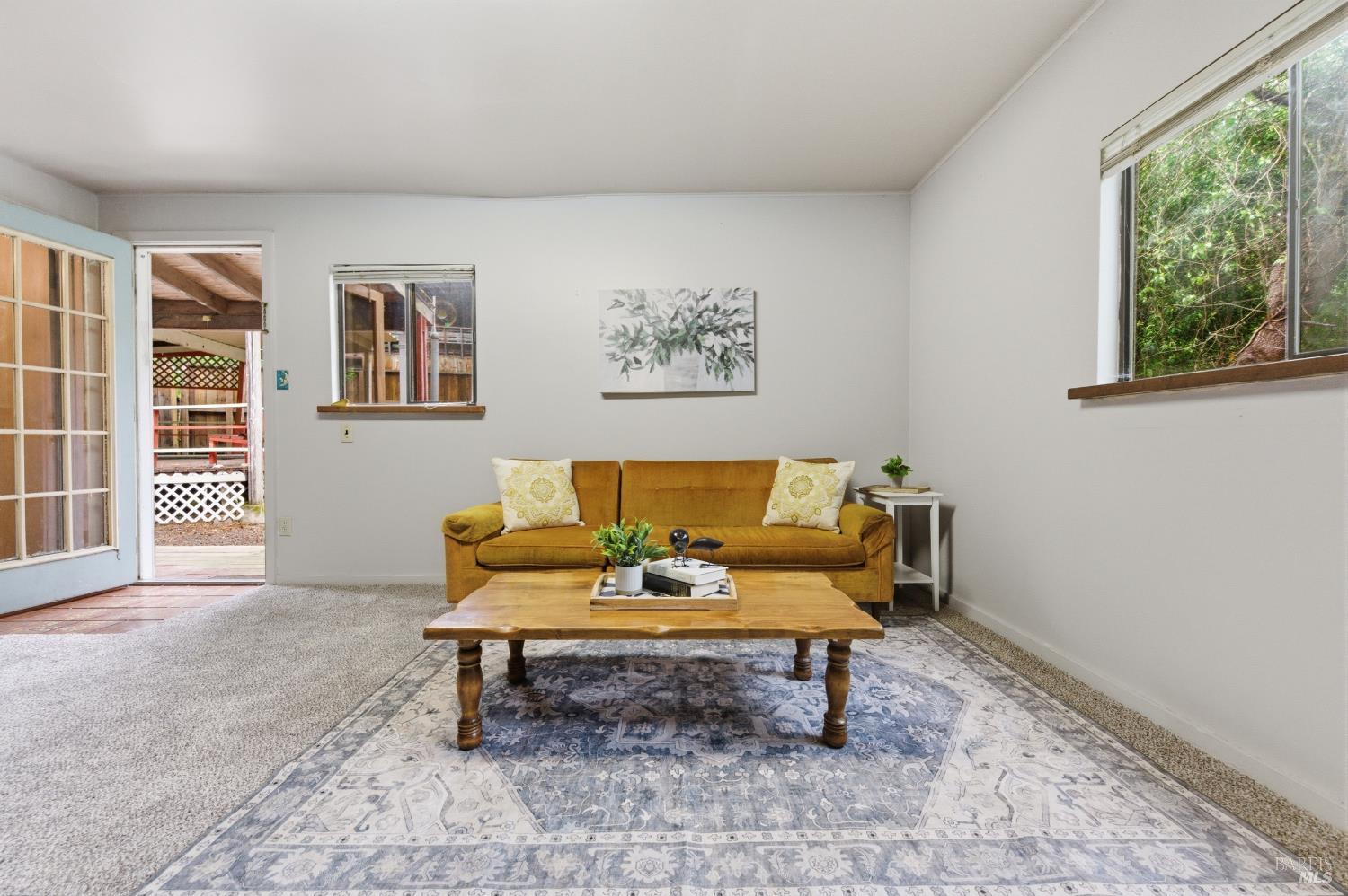 9489 Rio Vista Road Forestville, CA 95436 - Photo 13 of 32 a living room with furniture and a window