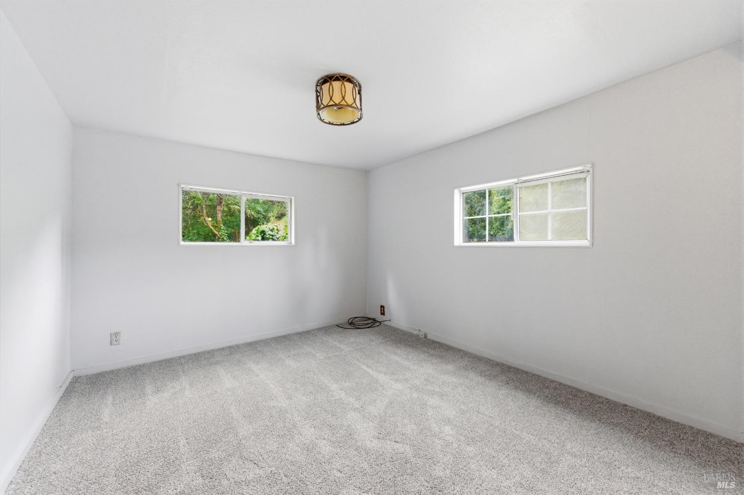 9489 Rio Vista Road Forestville, CA 95436 - Photo 22 of 32 an empty room with a window
