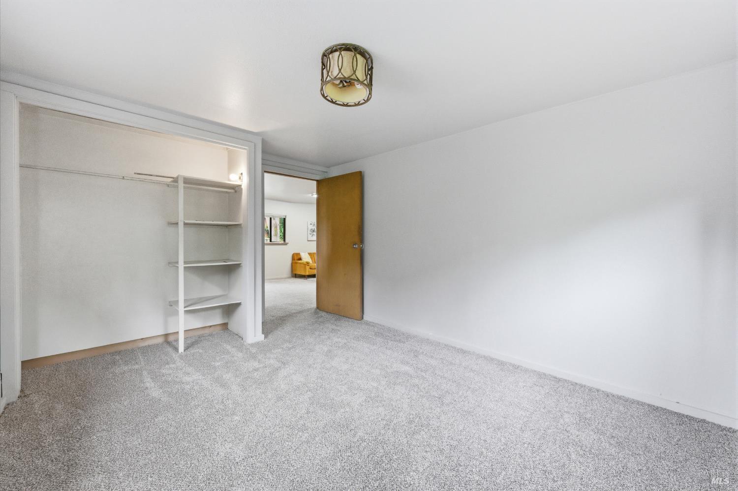 9489 Rio Vista Road Forestville, CA 95436 - Photo 23 of 32 a view of an empty room and a window