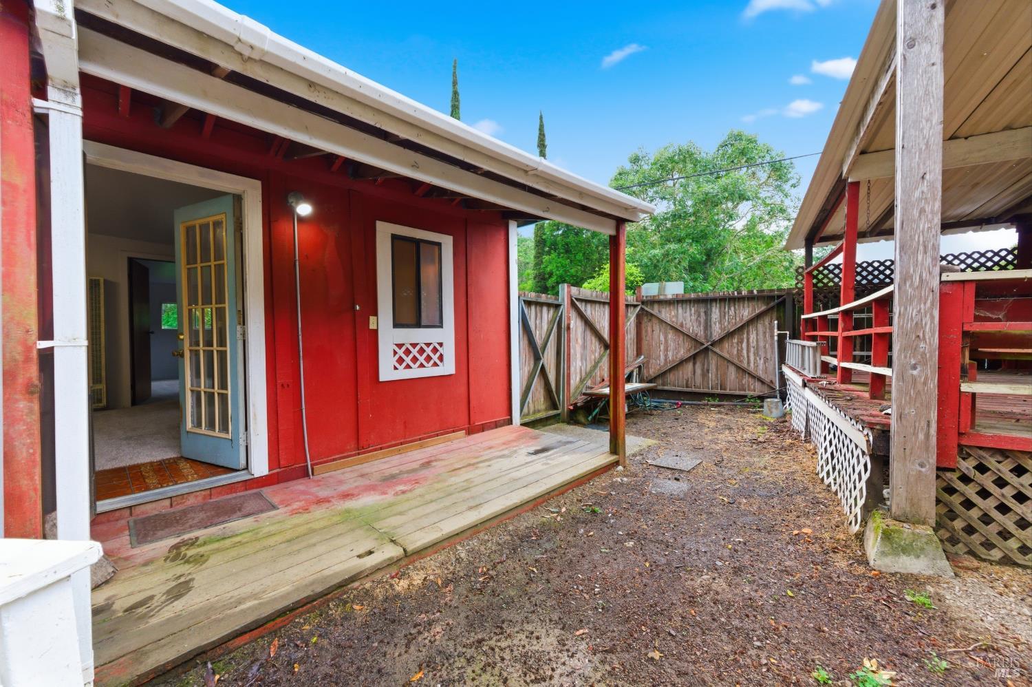 9489 Rio Vista Road Forestville, CA 95436 - Photo 6 of 32 a view of a house with backyard porch and sitting area