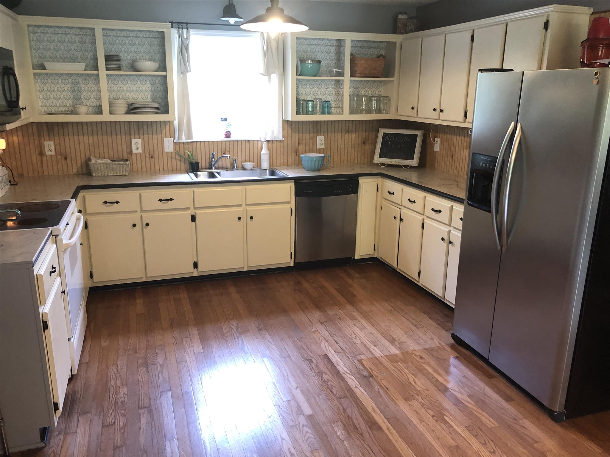 1073 Ervin Pace Road Chapmansboro, TN 37035 - Photo 13 of 19 Huge country kitchen with lots of counter space and crisp clean cabinets.