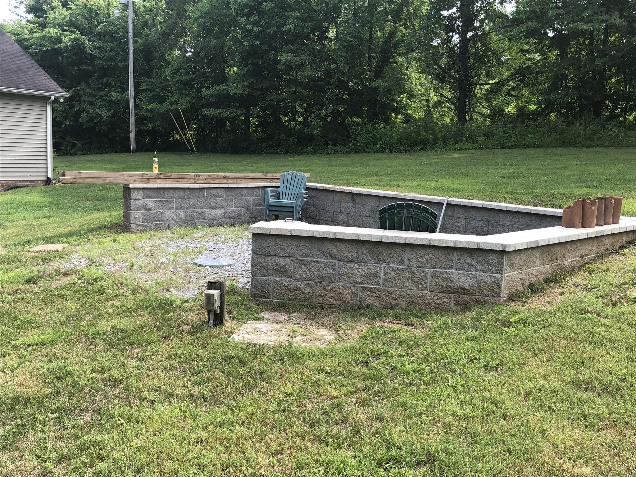 1073 Ervin Pace Road Chapmansboro, TN 37035 - Photo 6 of 19 Huge permanent fire pit in the back yard for those crisp fall nights while celebrating after a football game or just having a good ole throw down.