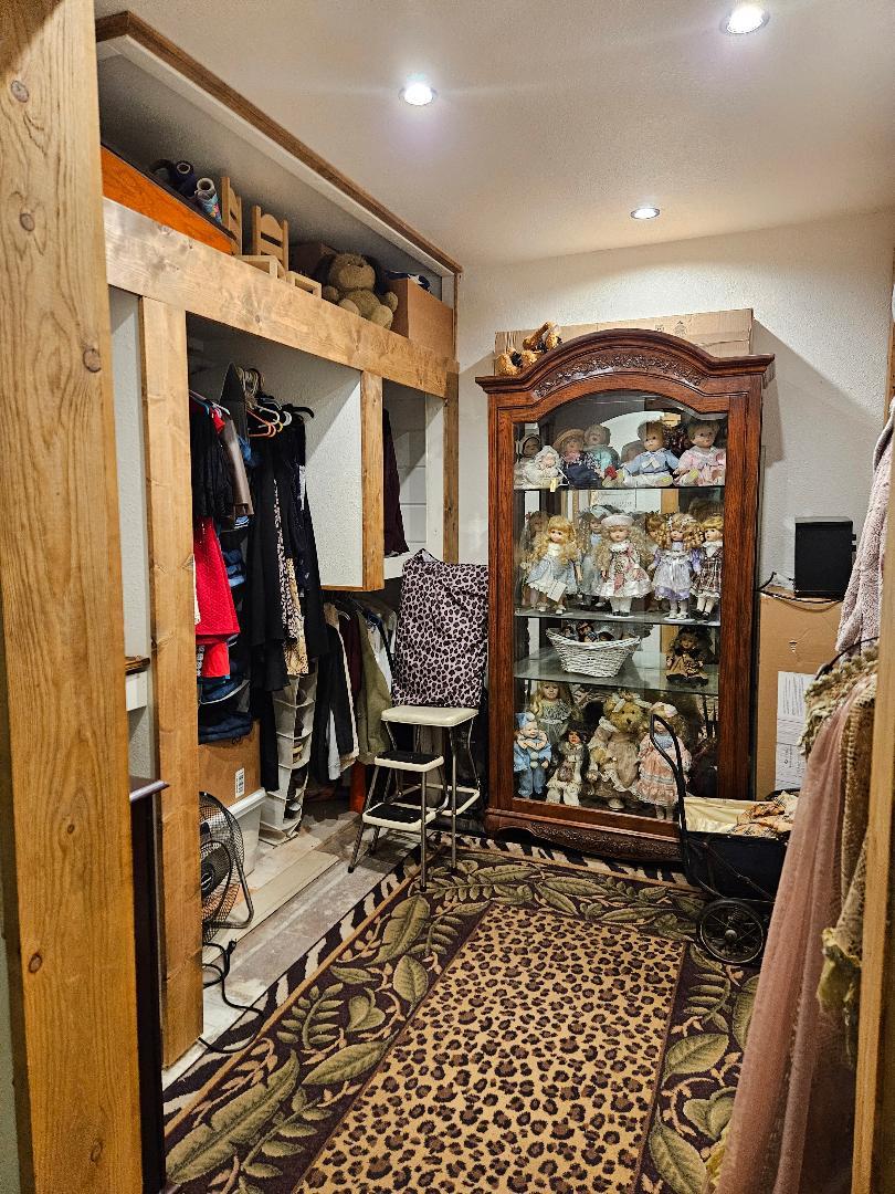 653 Center Street Princeton, CA 95970 - Photo 11 of 13 a room with lots of furniture and white walls