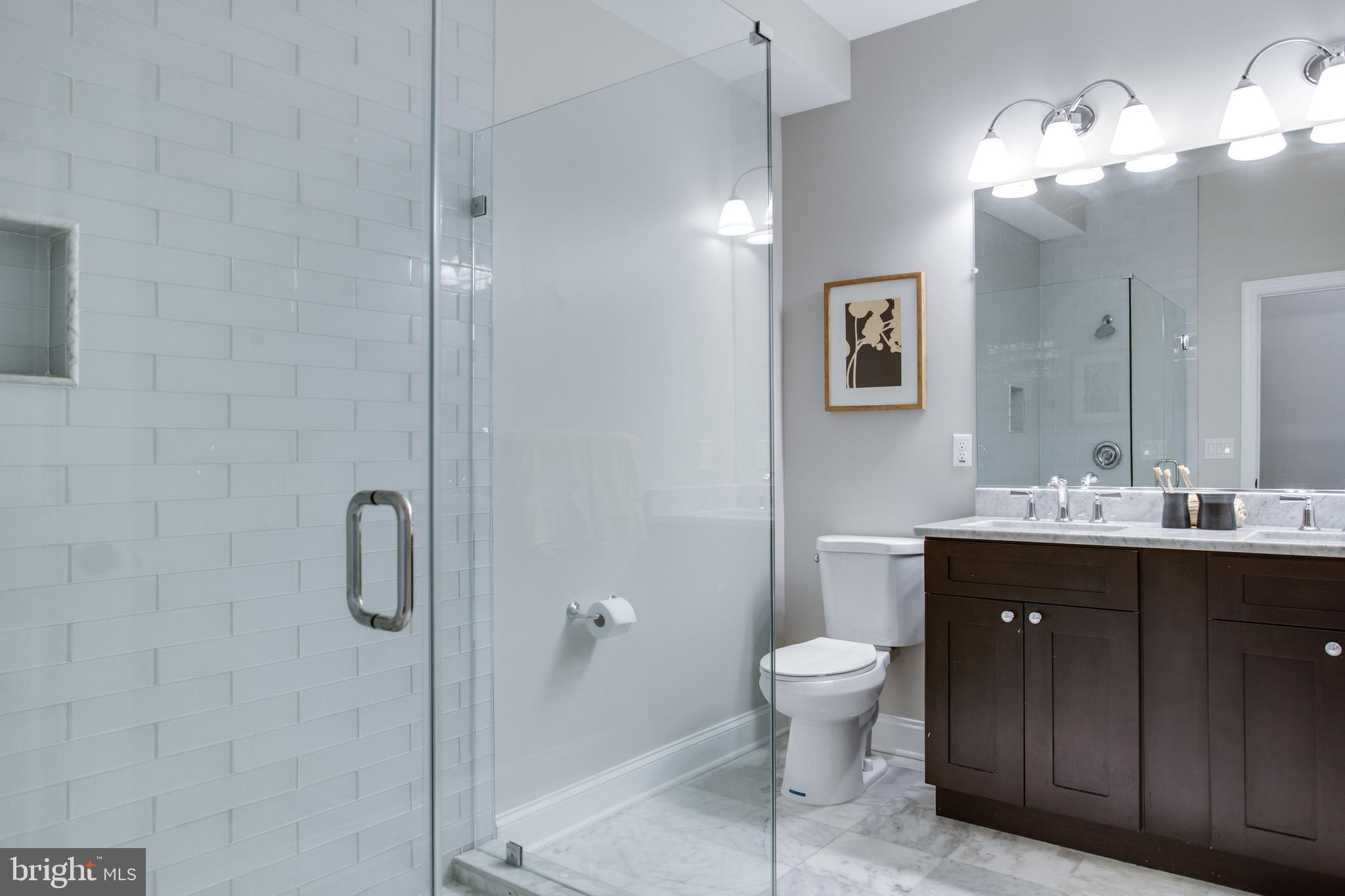 39 U Street Northeast, Unit 2 Washington, DC 20002 - Photo 12 of 29 Master bath with walk-in shower and dual vanities