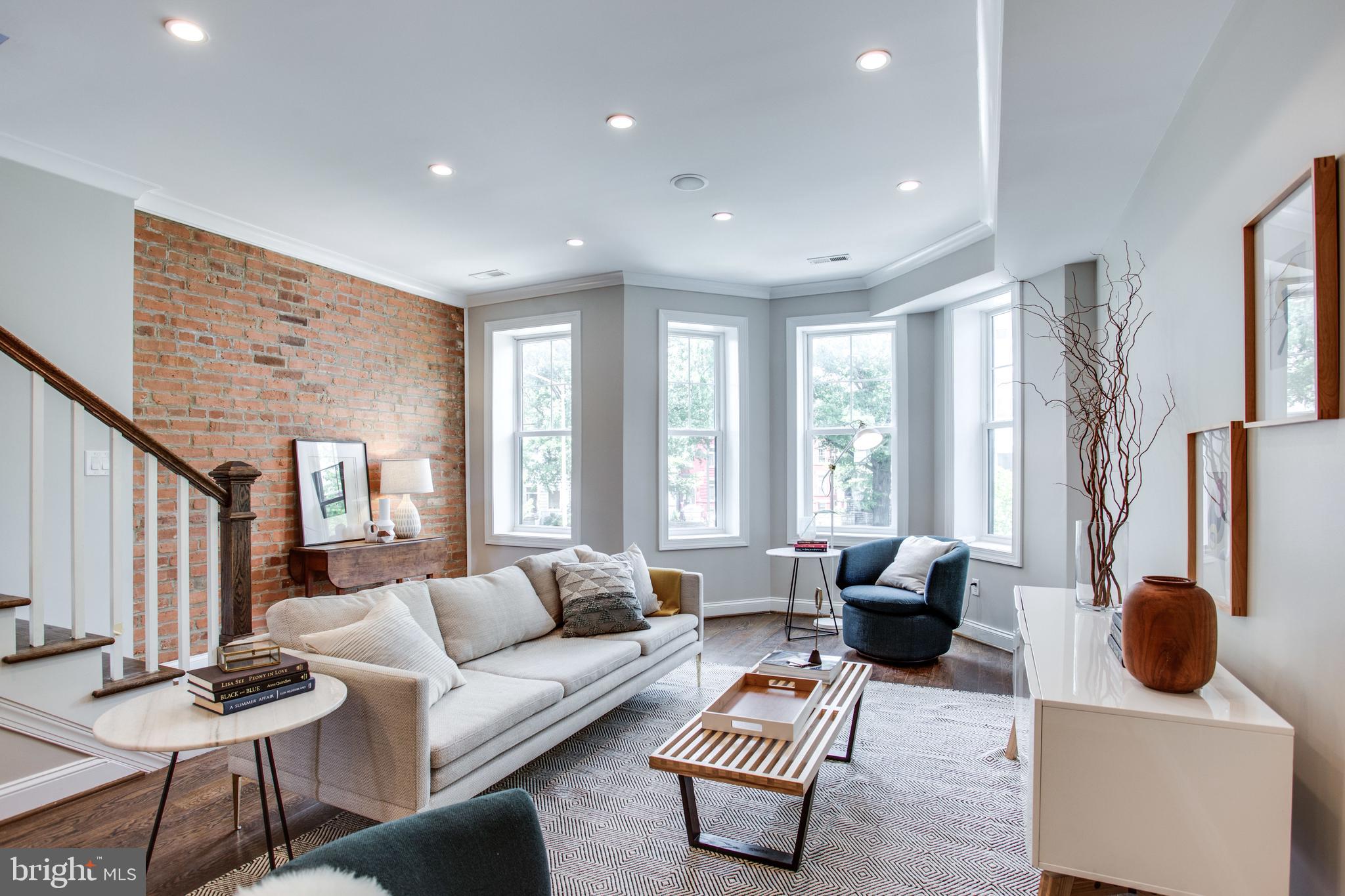 Solid hardwood floors & crown molding throughout
