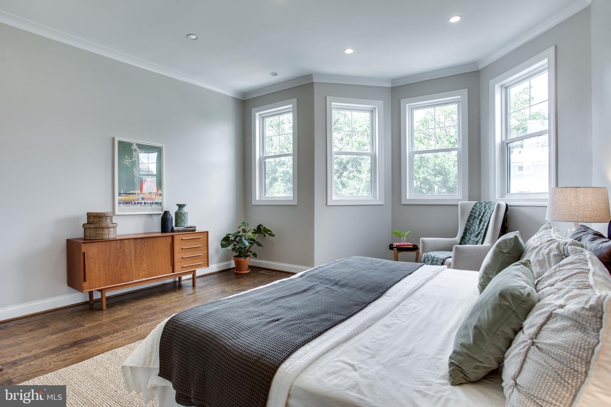 39 U Street Northeast, Unit 2 Washington, DC 20002 - Photo 9 of 29 Light-filled master bedroom with bay window